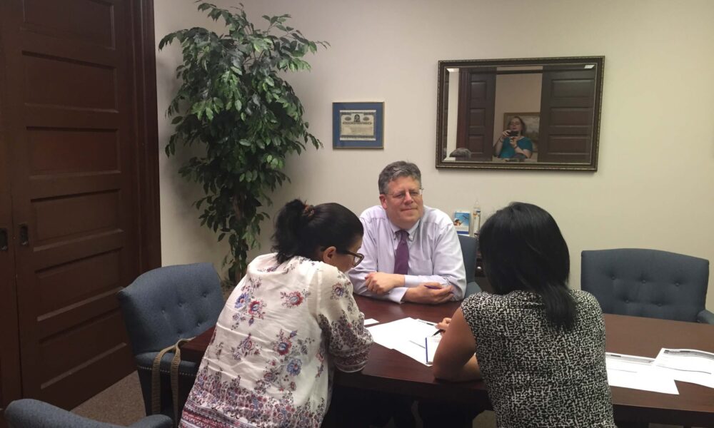 rich_desk_clients Clients at the conference table